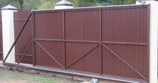 Купить откатные ворота из профнастила Назарово, цена от 1770 руб.
