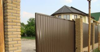 Купить откатные ворота из профнастила Назарово, цена от 1770 руб.